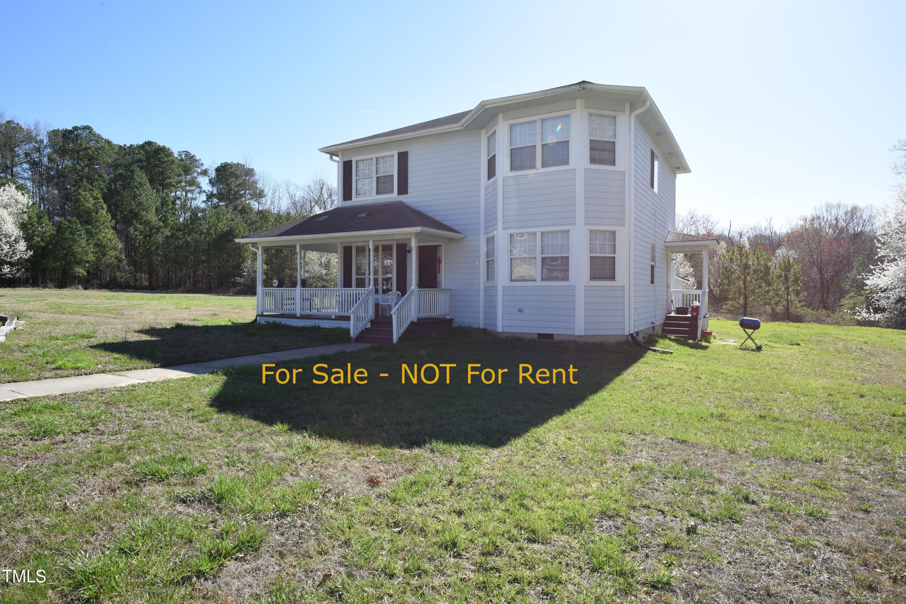 2913 Wadsworth Avenue Durham, NC 27707 - Photo 3 of 15 a front view of a house with a yard