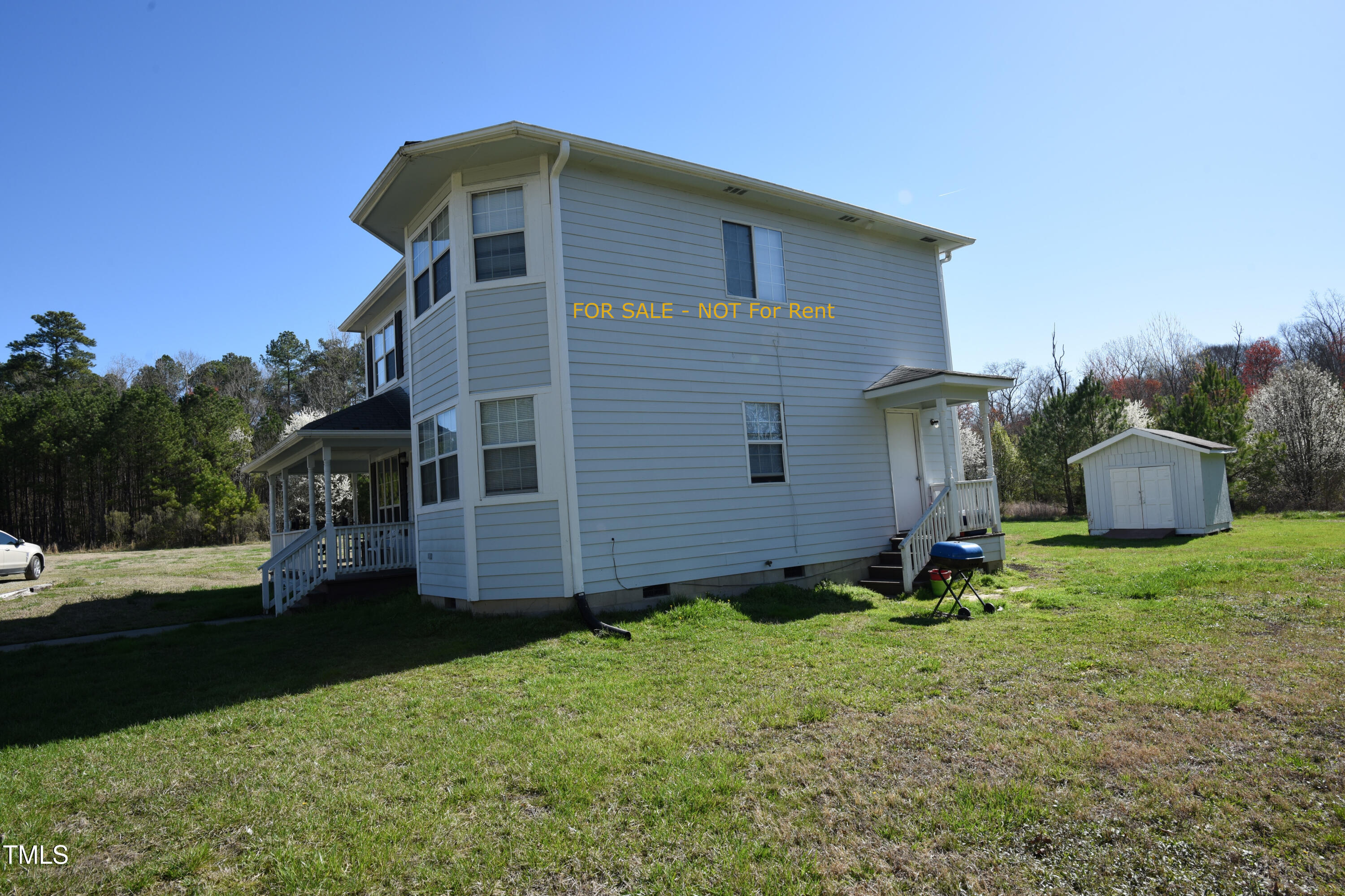 2913 Wadsworth Avenue Durham, NC 27707 - Photo 4 of 15 a front view of a house with garden