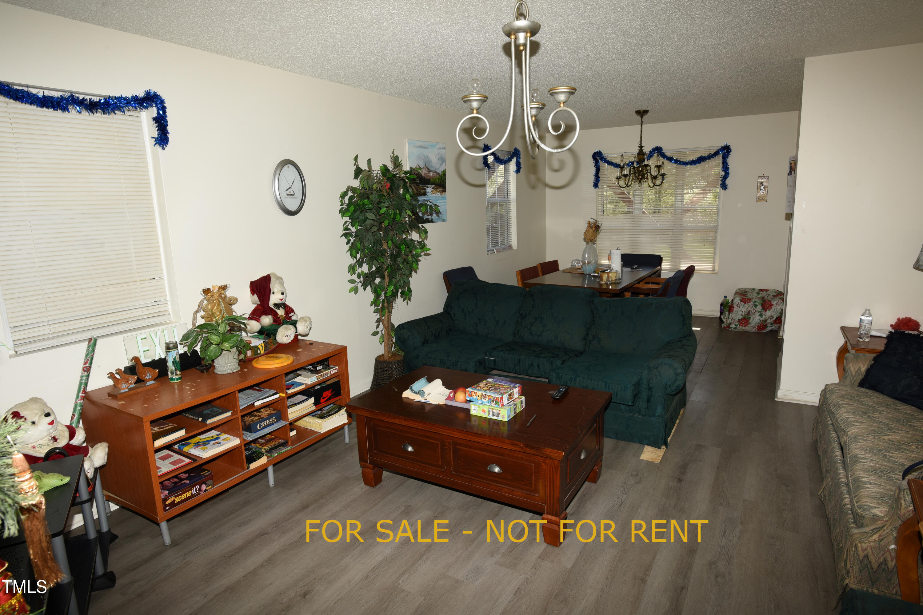 2913 Wadsworth Avenue Durham, NC 27707 - Photo 10 of 15 a living room with furniture and wooden floor