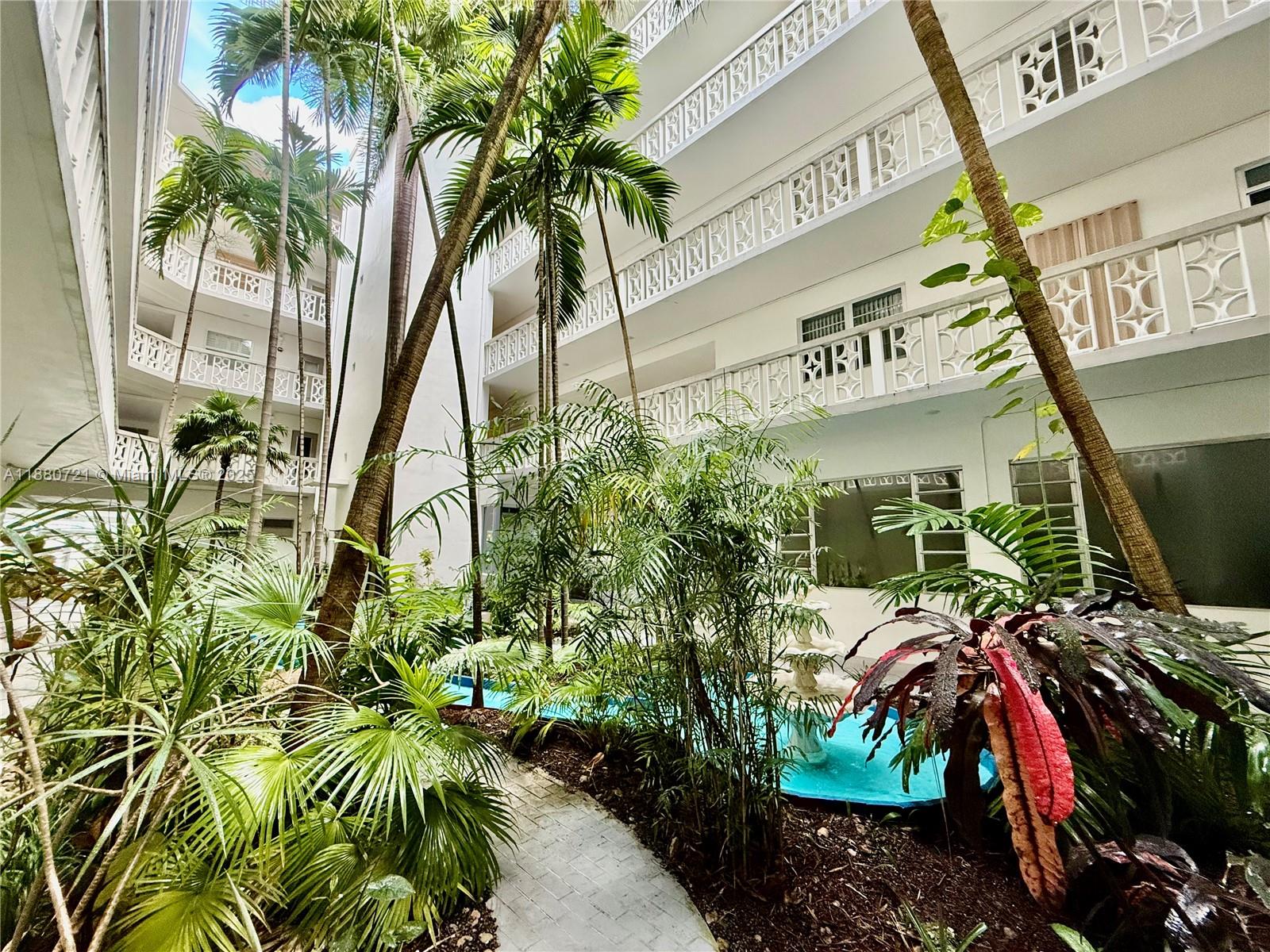 a view of a potted plant with sign board