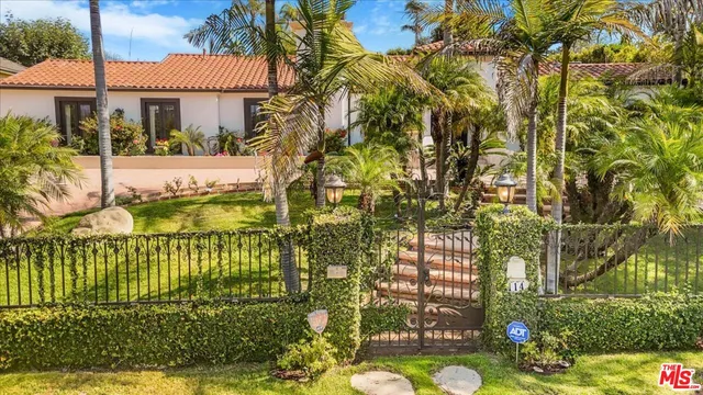 a view interior of a house with wooden floor a glass table and a chandelier