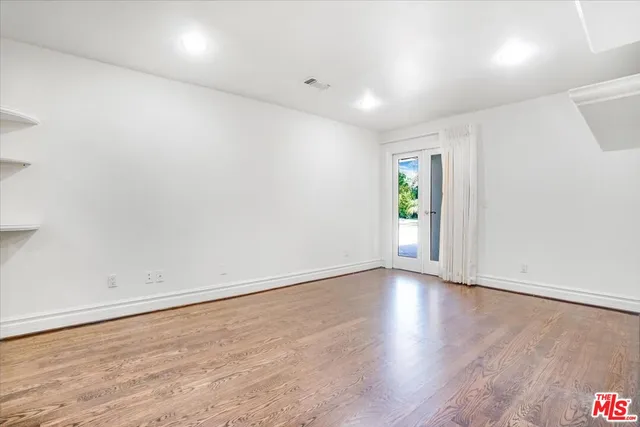 an empty room with a natural light