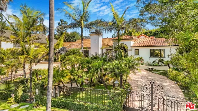 a house view with a garden space