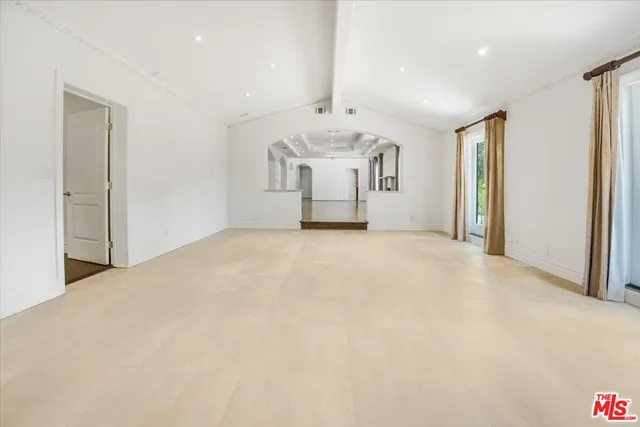 a bathroom with a shower and a toilet