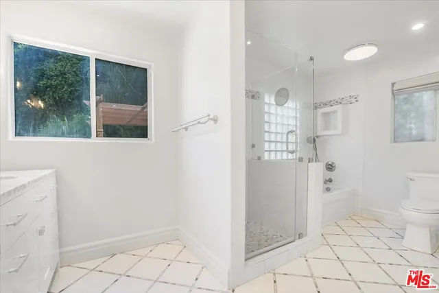 a view of a swimming pool with a yard