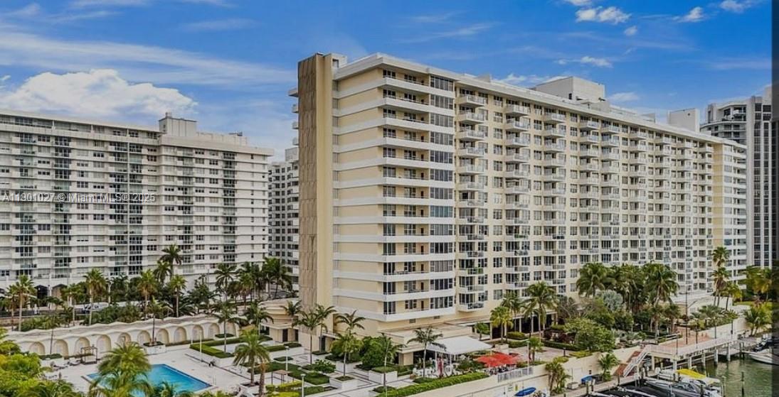 5600 Collins Avenue, Unit 14K Miami Beach, FL 33140 - Photo 26 of 27 a front view of a building