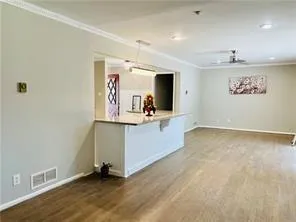 a kitchen with sink cabinets and window
