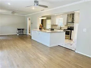 a view of front door with furniture and a fireplace