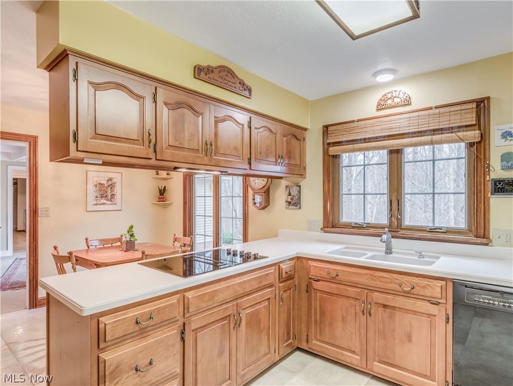 1050 Rambling Way Akron, OH 44333 - Photo 16 of 35 New cooktop in the Cherry Kitchen with Dinette