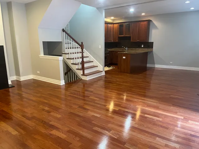 a view of kitchen with microwave and furniture