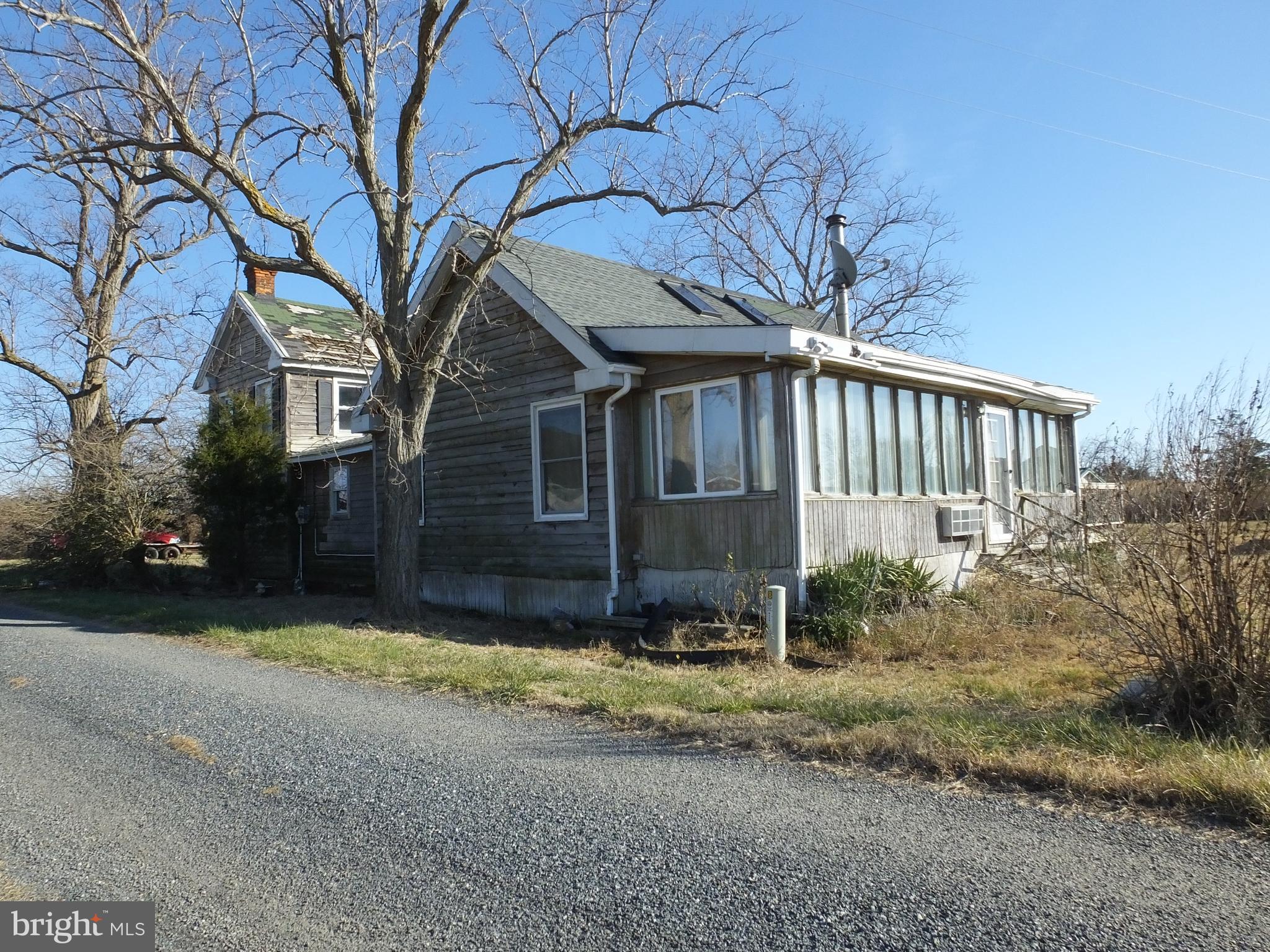 1213 Horse Point Road Fishing Creek, MD 21634 - Photo 11 of 23 a view of a house with a yard