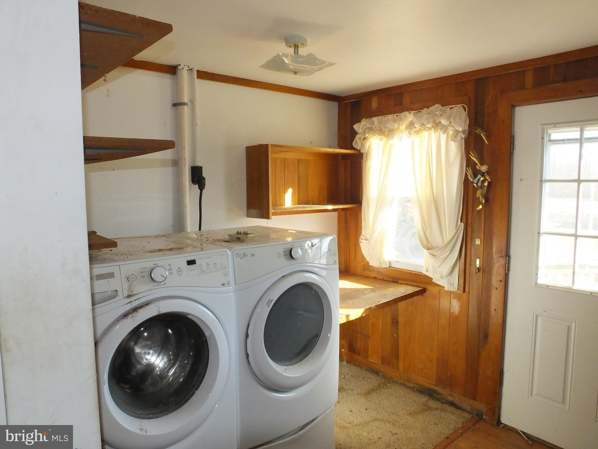 1213 Horse Point Road Fishing Creek, MD 21634 - Photo 18 of 23 a utility room with dryer and washer