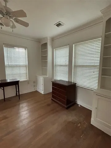 a room with furniture and window