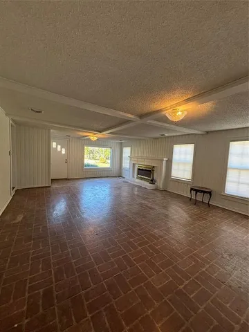 a view of a livingroom with furniture