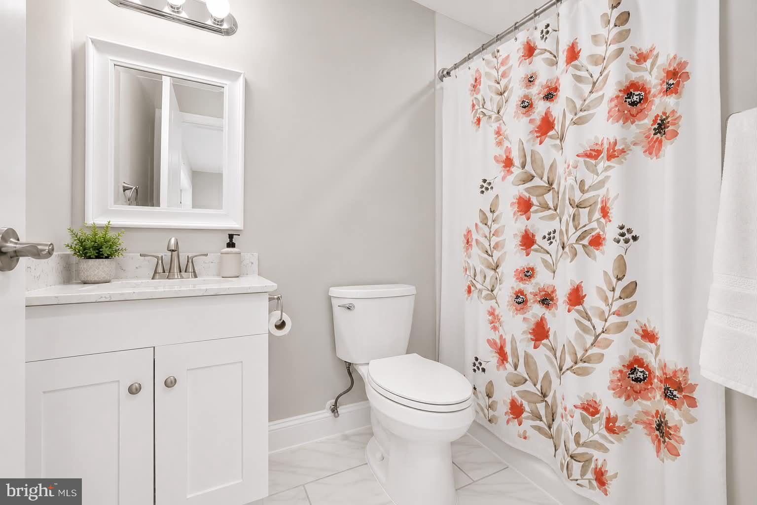 118 Ackerman Lane Ruther Glen, VA 22546 - Photo 30 of 57 a bathroom with a sink and a mirror