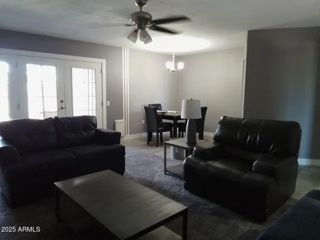 a kitchen with a stove a sink and a refrigerator