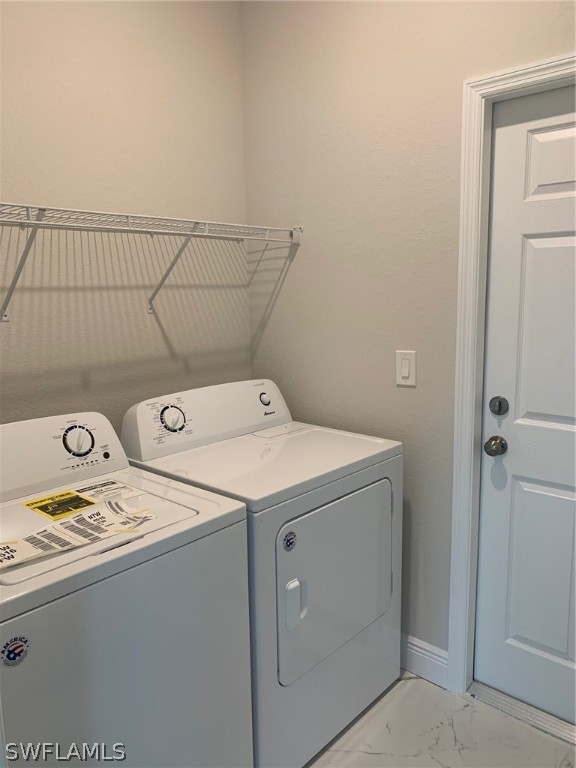 130 Southwest 37th Avenue Cape Coral, FL 33991 - Photo 28 of 30 a utility room with dryer and washer