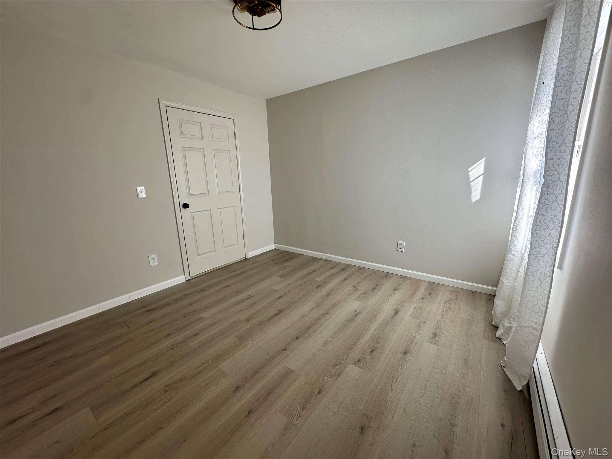 1241 Ridgebury Road New Hampton, NY 10958 - Photo 14 of 21 a view of a room with wooden floor