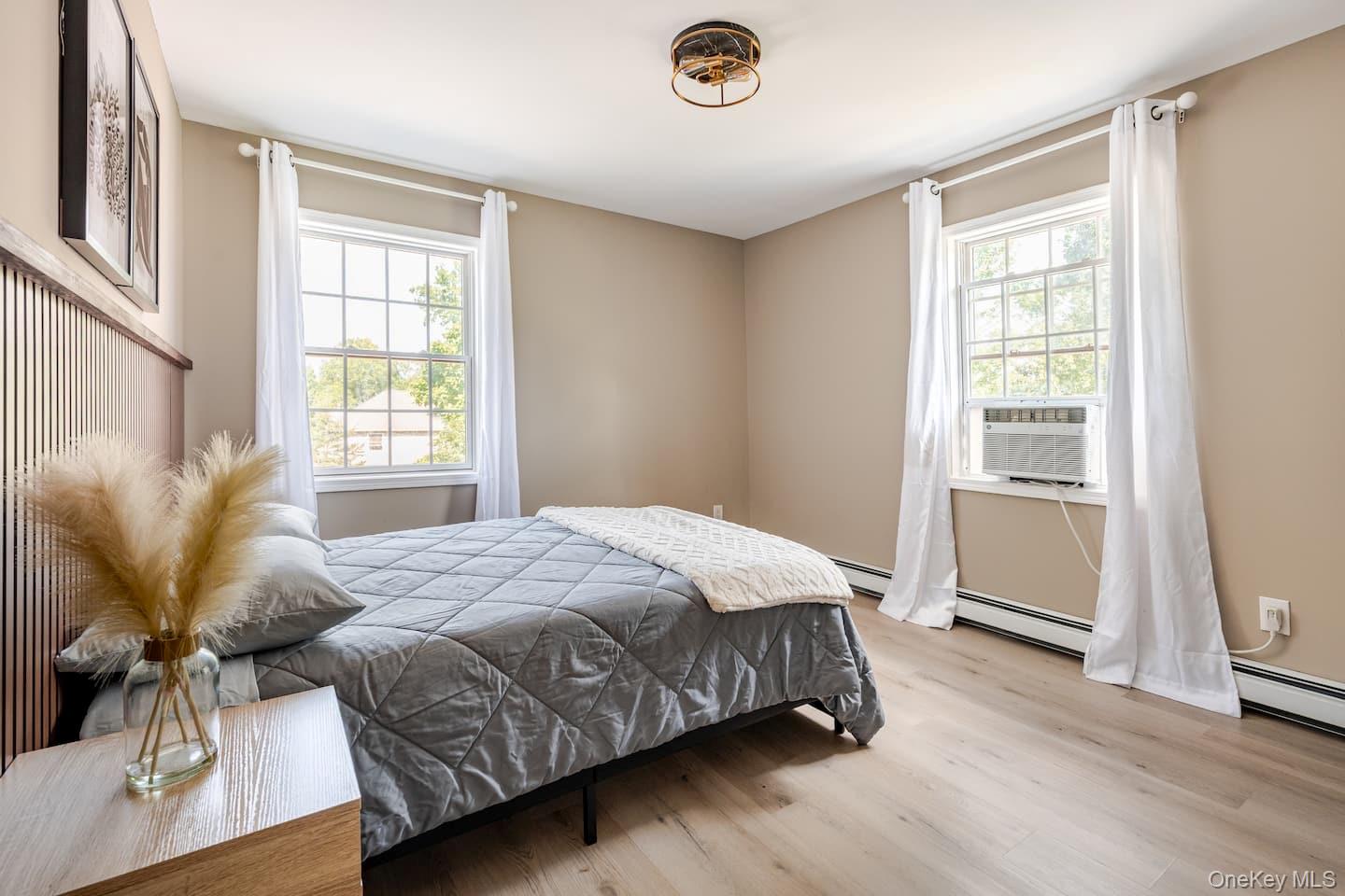 1241 Ridgebury Road New Hampton, NY 10958 - Photo 9 of 21 a bedroom with a bed and window