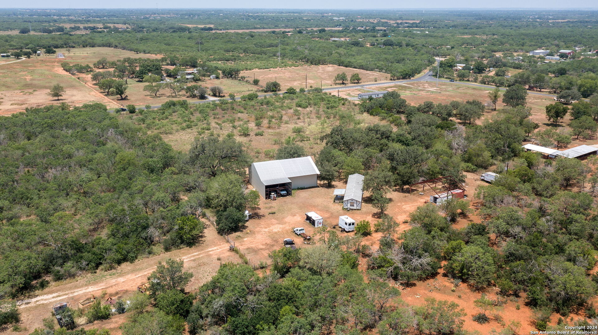 19366 Benton City Road Von Ormy, TX 78073 - Photo 15 of 24 an aerial view of a city with lots of residential buildings