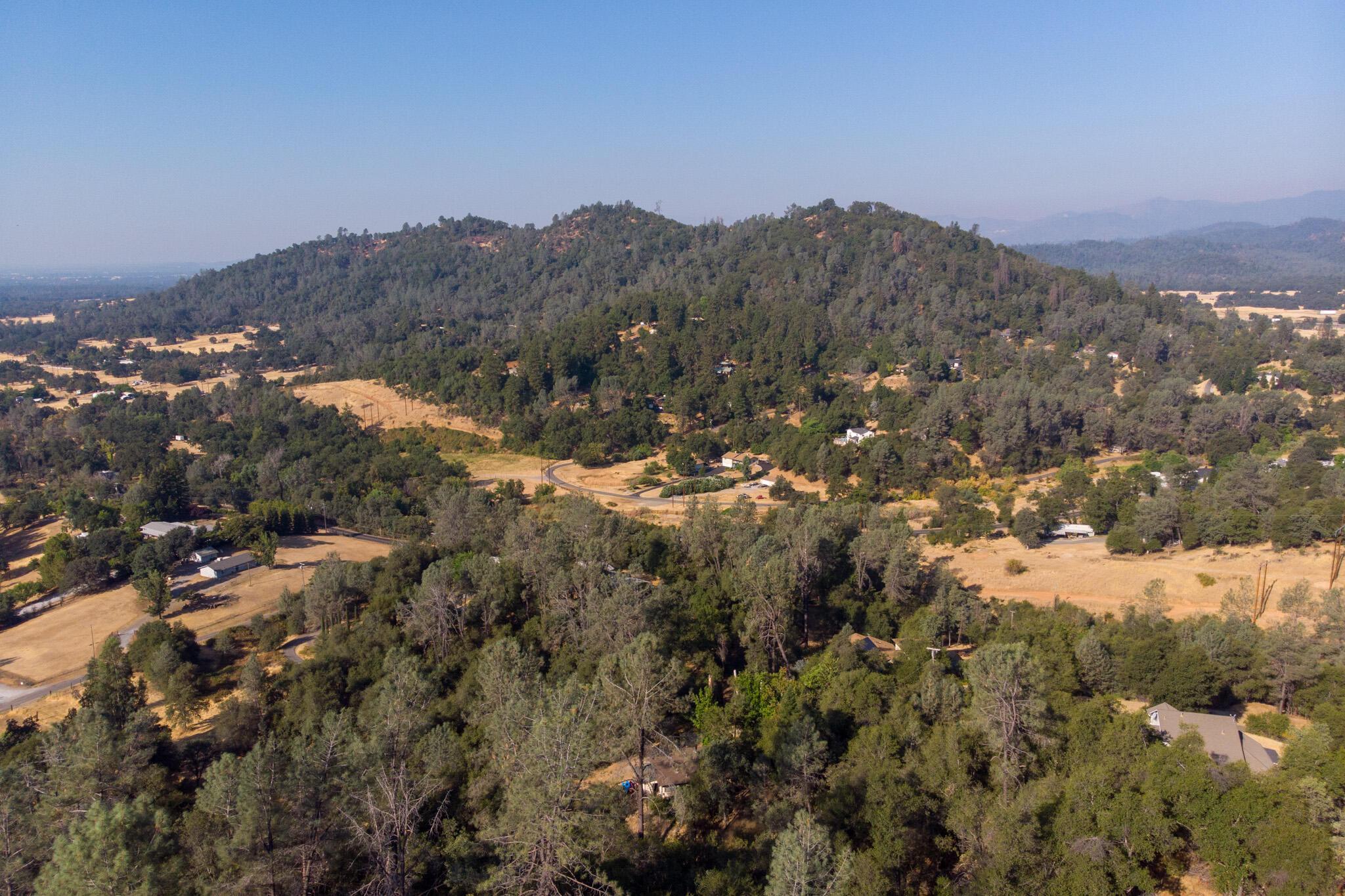 0 Wintu Way Redding, CA 96003 - Photo 10 of 11 a view of a city with mountains in the background