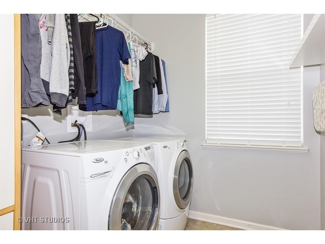 3153 Riley Road Montgomery, IL 60538 - Photo 14 of 15 a utility room with dryer and washer