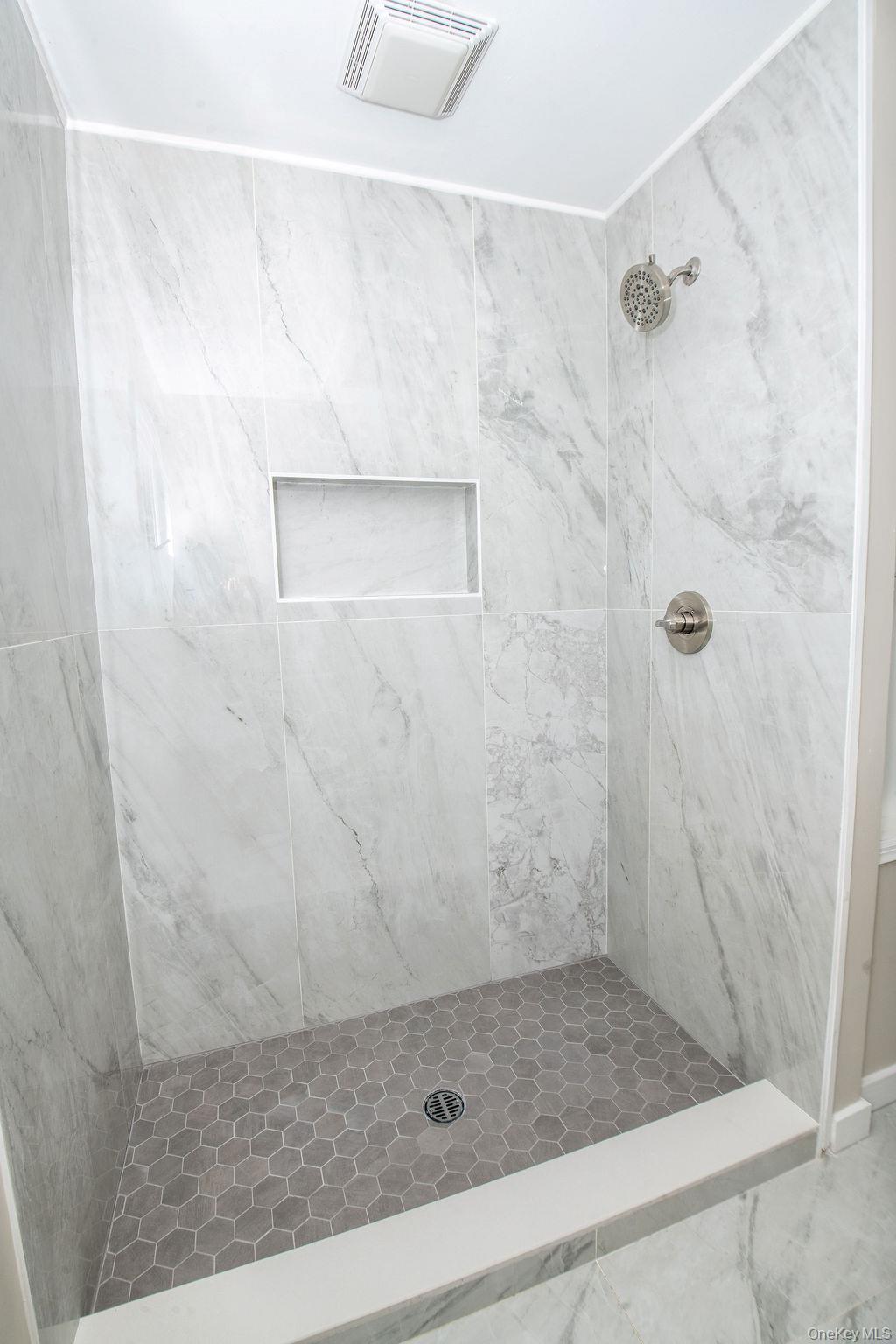 15 East Clearwater Road Lindenhurst, NY 11757 - Photo 13 of 25 a bathroom with a shower