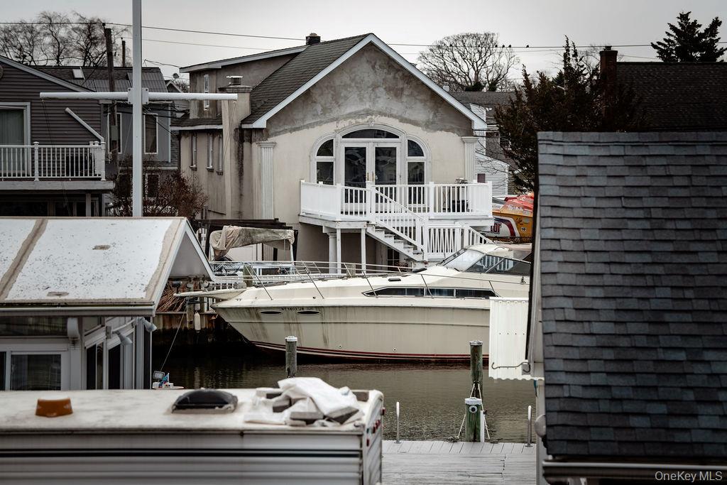 15 East Clearwater Road Lindenhurst, NY 11757 - Photo 25 of 25 a view of a house with roof deck