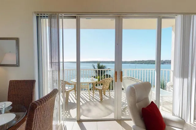 a view of balcony with furniture