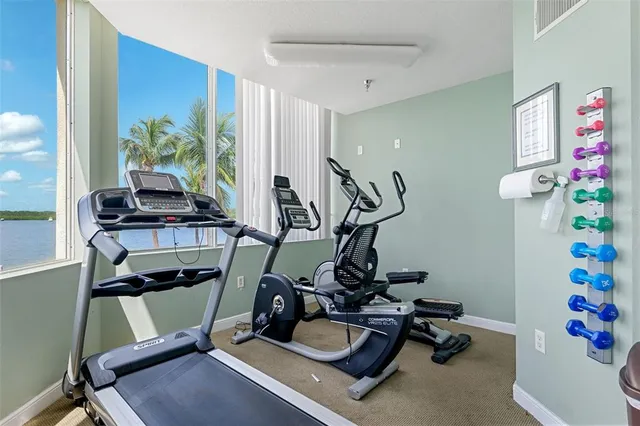 a view of a chairs and table in a patio