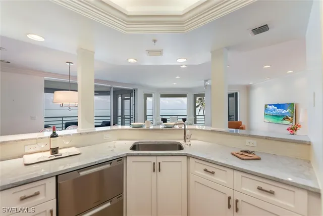 a kitchen with sink and window