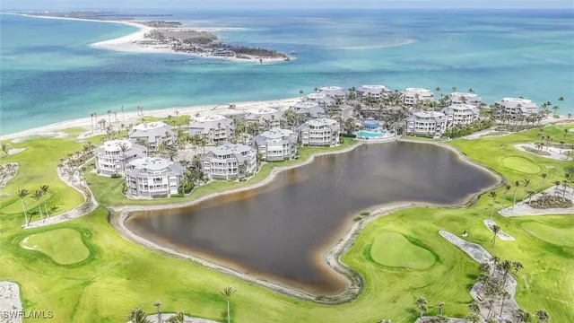 a view of a swimming pool with a yard
