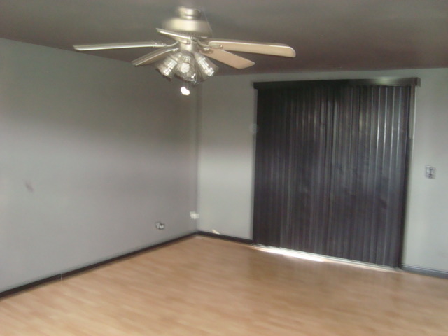 109 Cloverleaf Road Matteson, IL 60443 - Photo 18 of 25 a view of an empty room with a chandelier fan