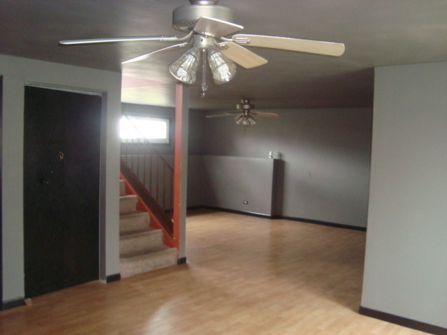 109 Cloverleaf Road Matteson, IL 60443 - Photo 24 of 25 a view of a room with lamp and stairs
