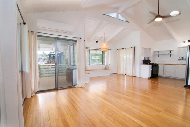 a view of a kitchen with a wooden floor