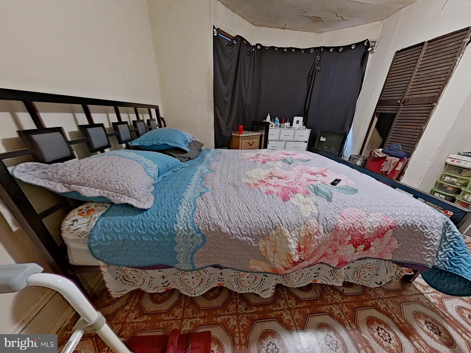 5152 Funston Street Philadelphia, PA 19139 - Photo 12 of 22 a bedroom with a bed and a mirror