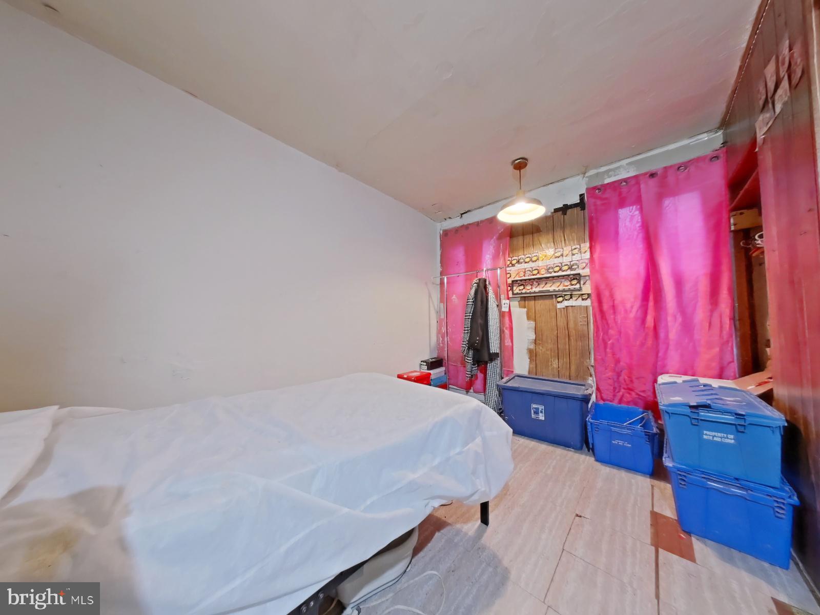 5152 Funston Street Philadelphia, PA 19139 - Photo 15 of 22 a bedroom with a bed and a closet