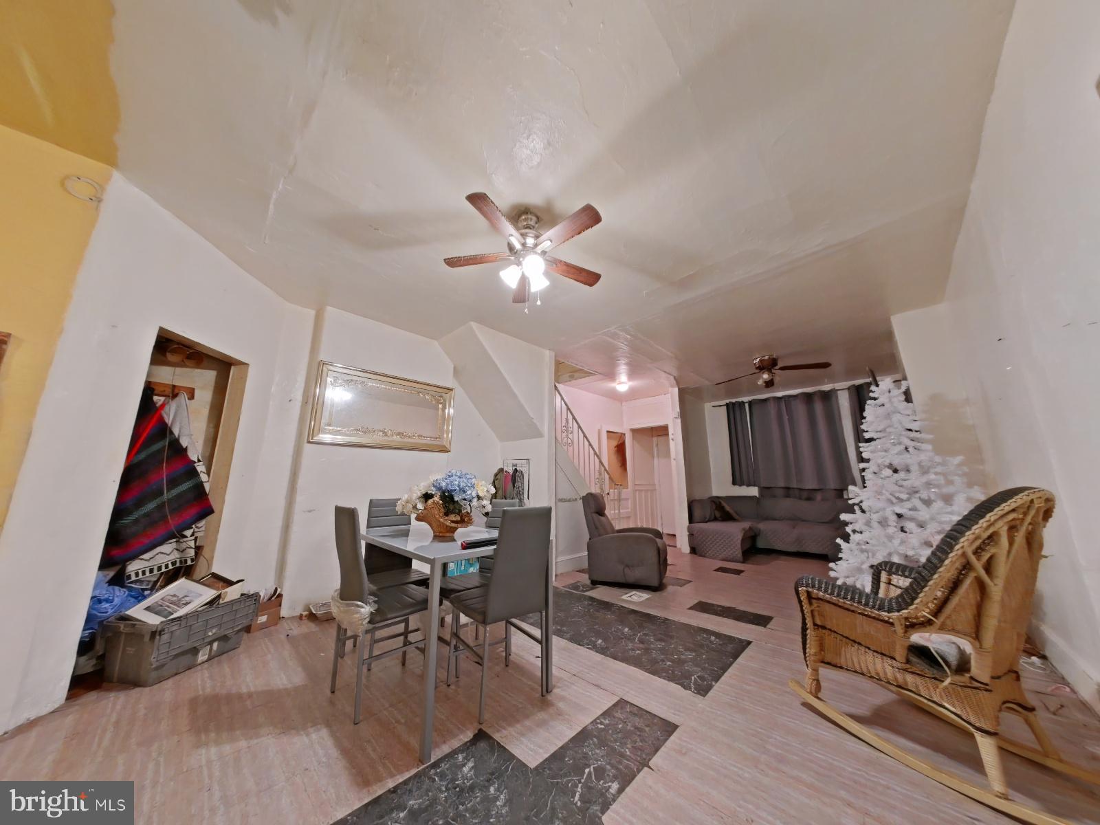 5152 Funston Street Philadelphia, PA 19139 - Photo 7 of 22 a living room with furniture and kitchen view
