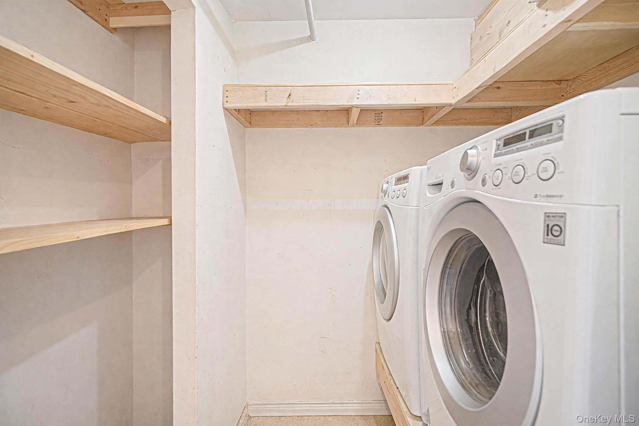 19 Goodwin Lane Coram, NY 11727 - Photo 20 of 36 a utility room with dryer and washer