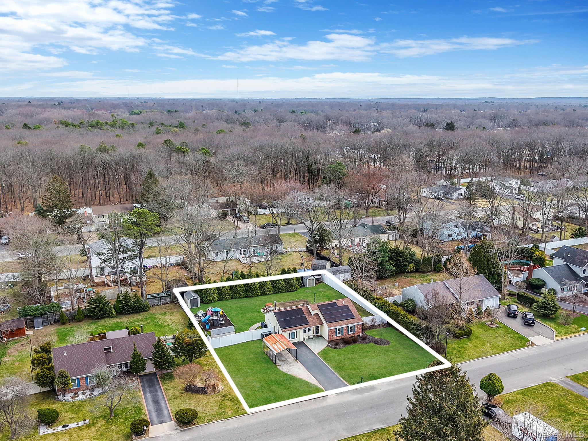 19 Goodwin Lane Coram, NY 11727 - Photo 33 of 36 a view of a city
