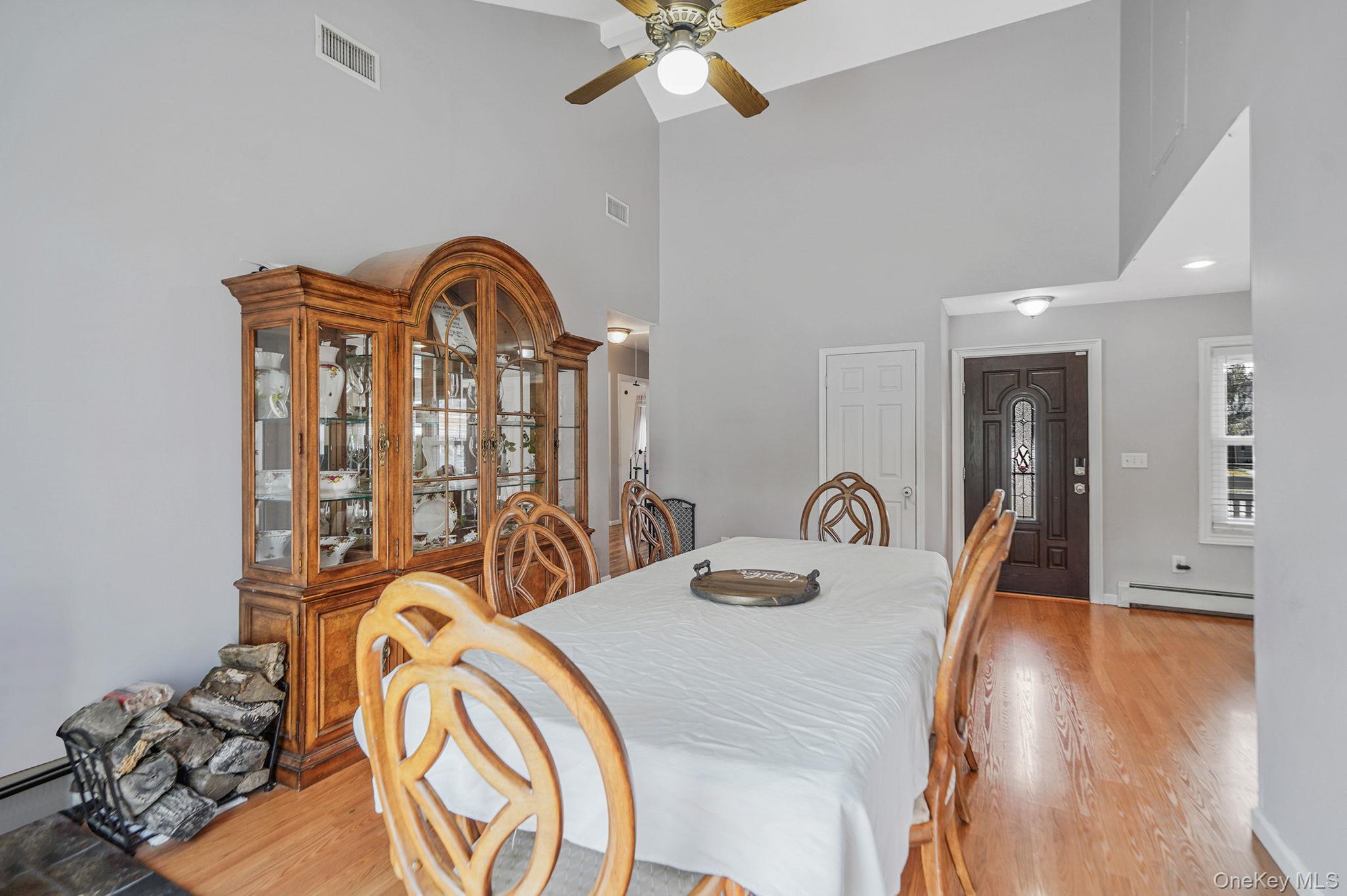 19 Goodwin Lane Coram, NY 11727 - Photo 6 of 36 a view of a livingroom with furniture