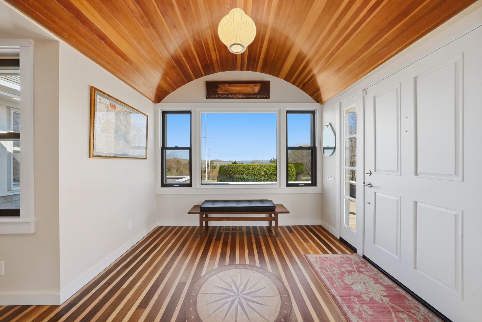 247 Polpis Road Nantucket, MA 02554 - Photo 5 of 52 a view of a balcony with wooden floor