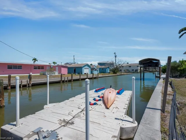 a view of a lake with sitting area