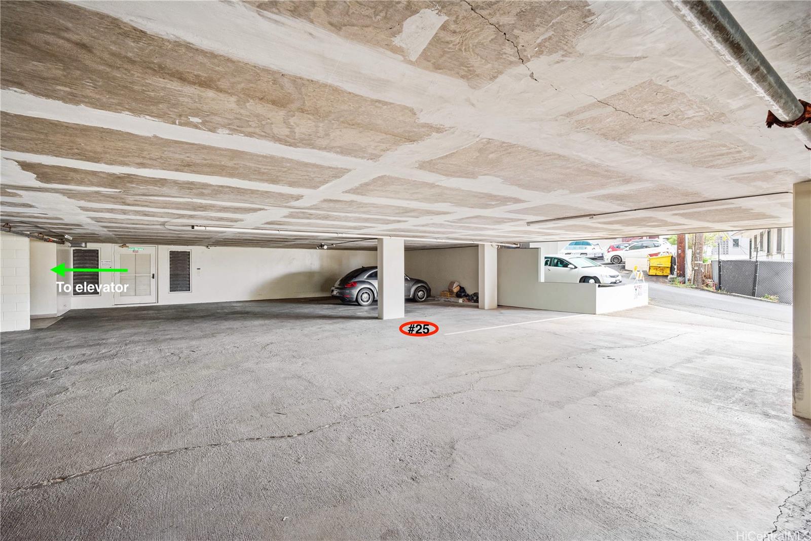 670 Prospect Street, Unit II501 Honolulu, HI 96813 - Photo 18 of 25 covered stall right by the driveway entrance and pillars between yourself and the next car.