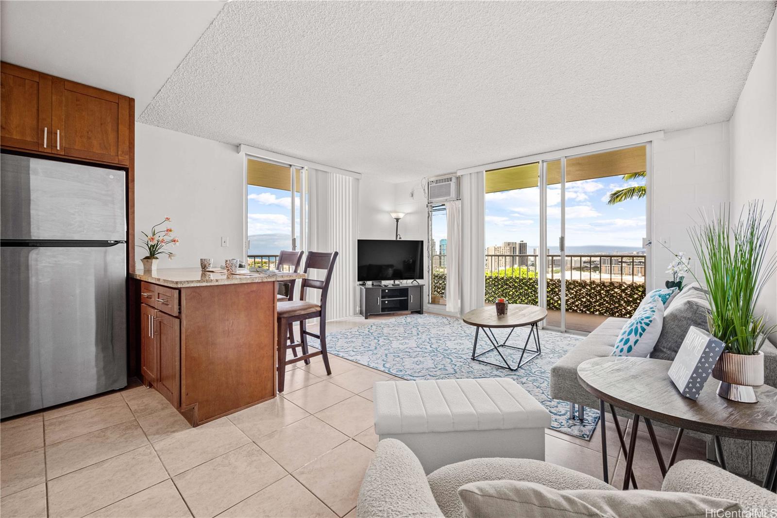 670 Prospect Street, Unit II501 Honolulu, HI 96813 - Photo 2 of 25 note the island that serves as a dining room table.