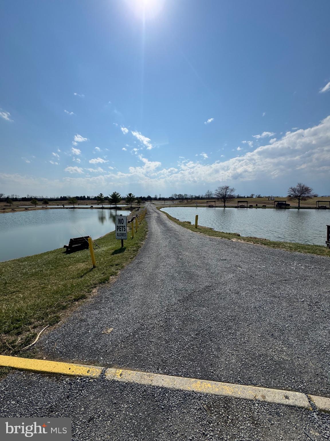 878 Hatchery Road Inwood, WV 25428 - Photo 13 of 131 a view of a lake with an outdoor space