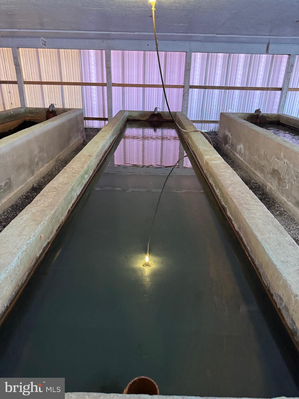 878 Hatchery Road Inwood, WV 25428 - Photo 50 of 131 a living room with a bed