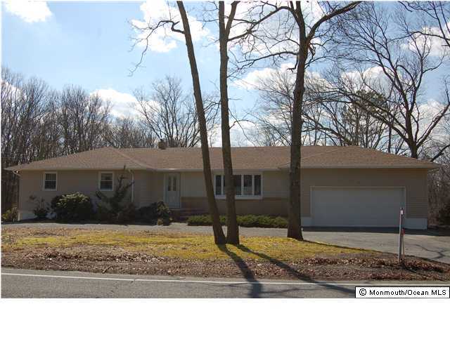 128 North Cooks Bridge Road Jackson, NJ 08527 - Photo 1 of 3 a front view of a house