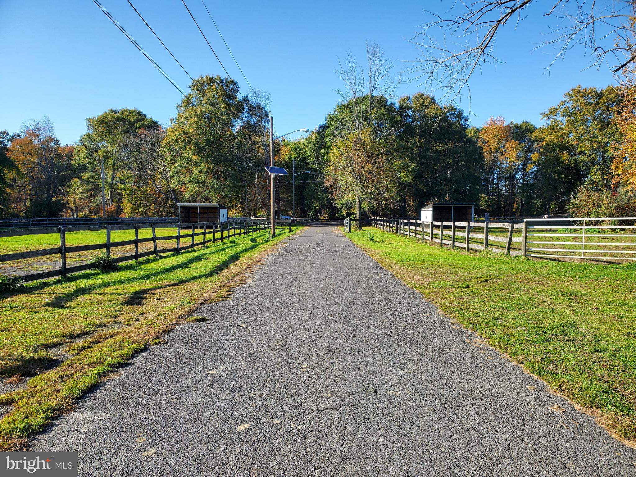 2328 Monmouth Road Jobstown, NJ 08041 - Photo 43 of 54 a view of a park with swings and slides