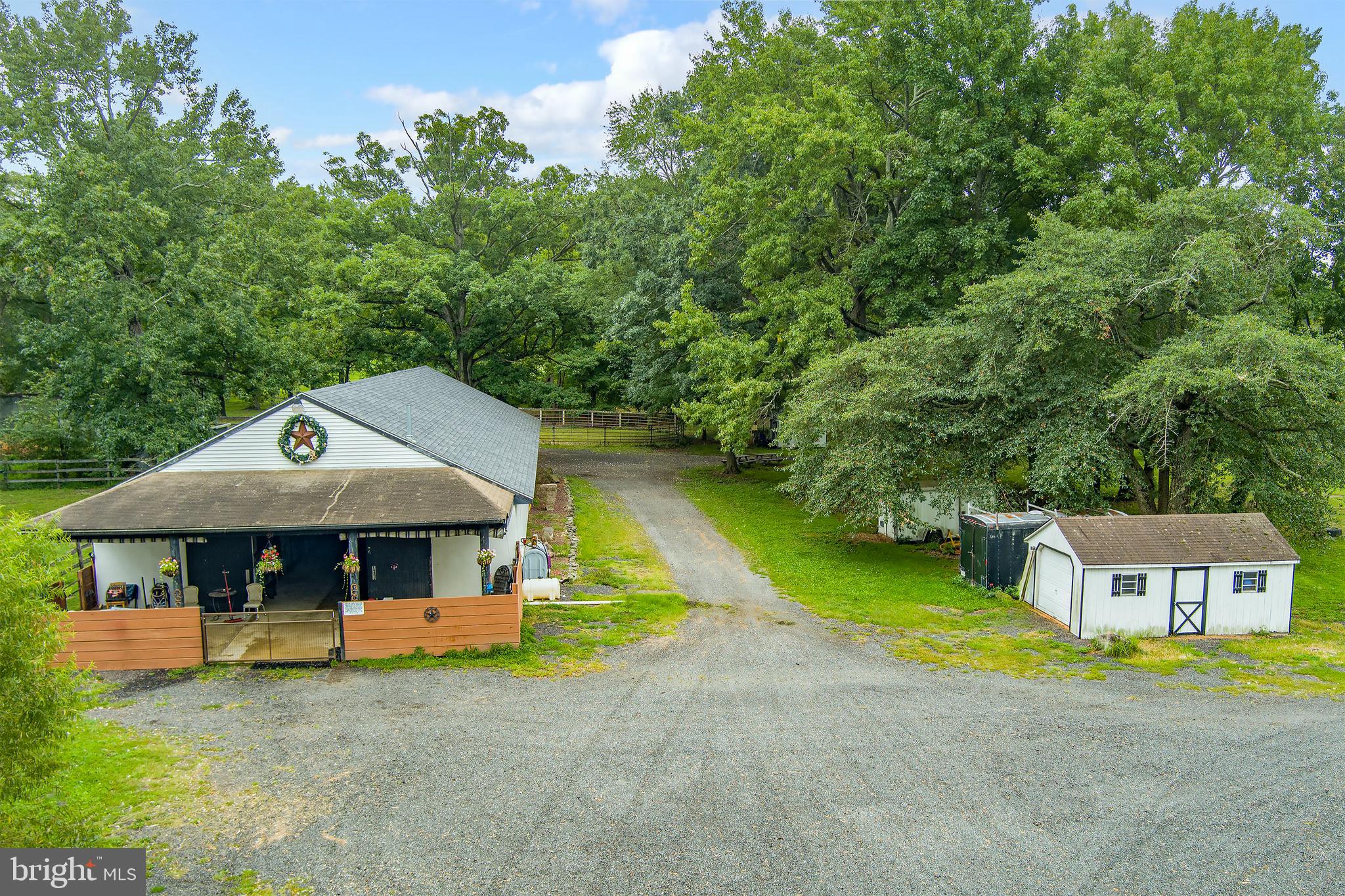 2328 Monmouth Road Jobstown, NJ 08041 - Photo 5 of 54 a front view of a house with garden
